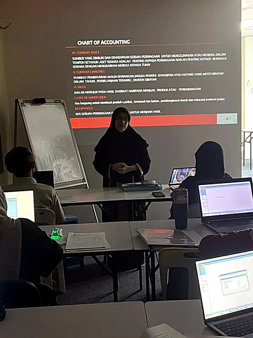 Trainer leading a chart-of-accounting session at the academy